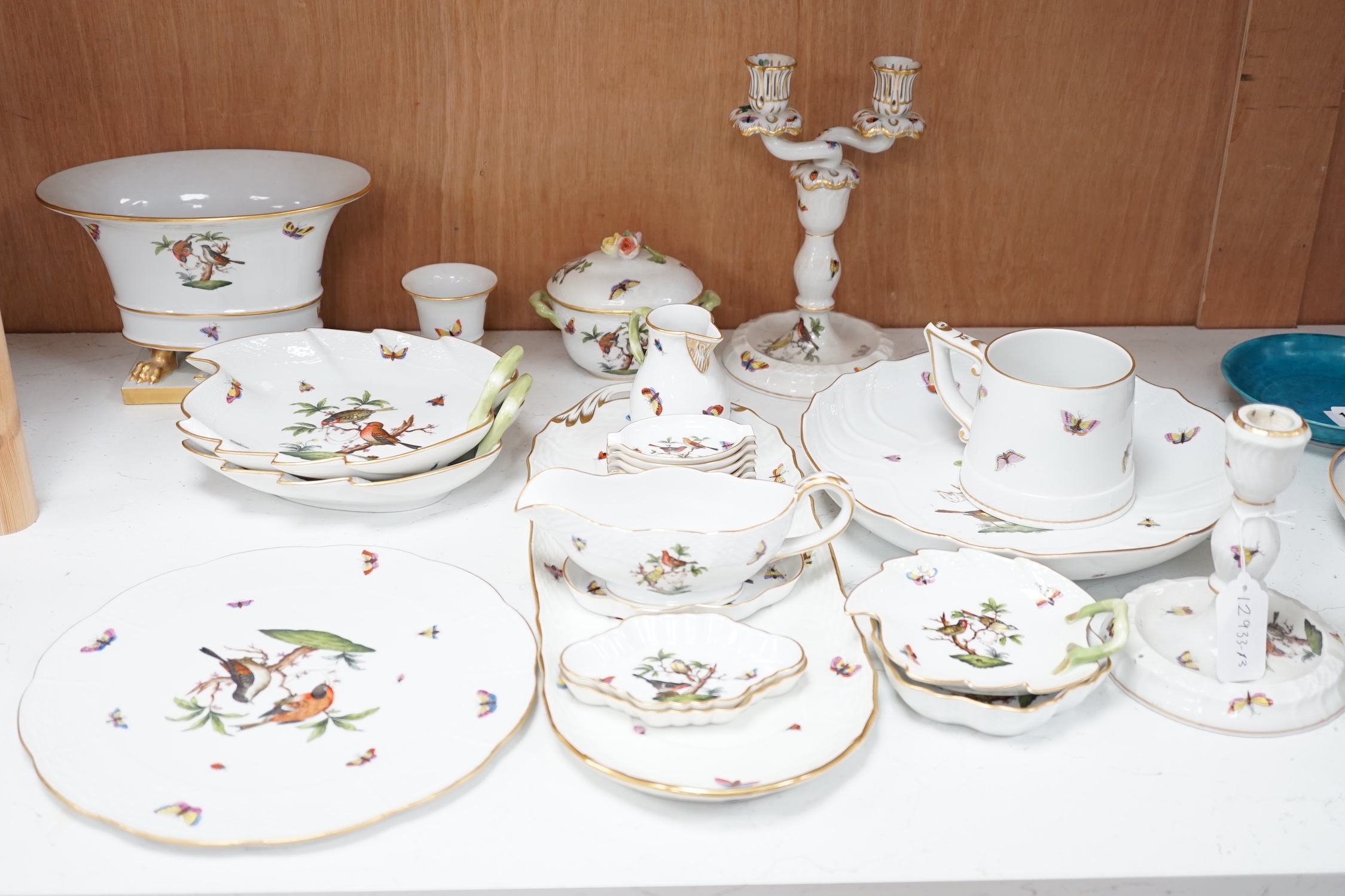 A group of Herend Rothschild 'birds' pattern decorative wares, and two Herend fruit pattern toast racks